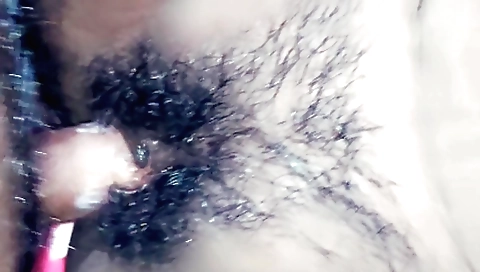Amateur erotic video featuring a sexy lady with a hairy pussy