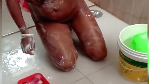 Sexy brunette girl gets naked in her bath and shows off