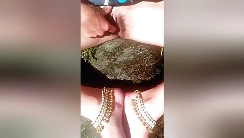 Hot amateur milf masturbating on a spring fountain