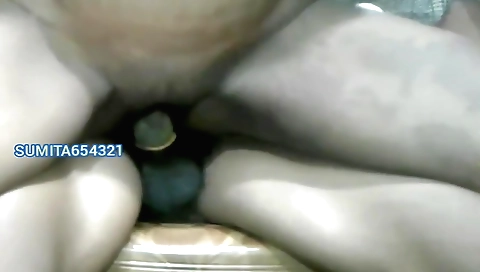 Indian chick in a white dress and bra on amateur video