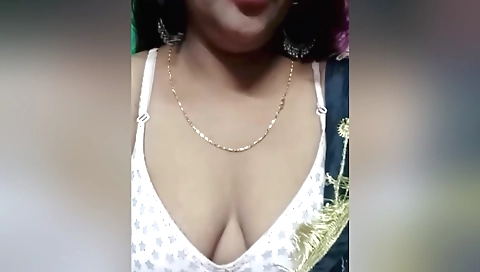 Indian girl in a black dress is playing with her lover