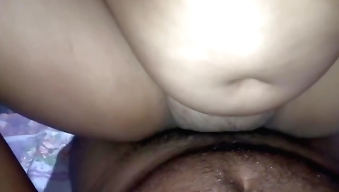 Chick in red dress is making a porn vid with her hairy pussy