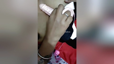 Indian woman enjoys getting off from her own dildo