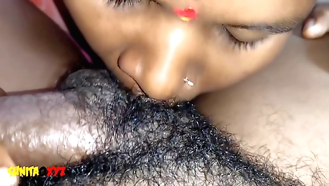 Amateur brunette getting a blowjob from her husband