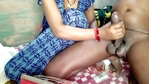 Cute brunette with a pink bikini is getting a handjob