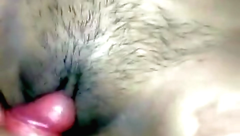 Indian brunette with a round booty plays with hairy pussy