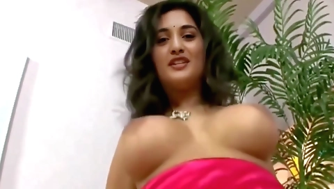 Indian babe in a sexy outfit enjoys a passionate fuck